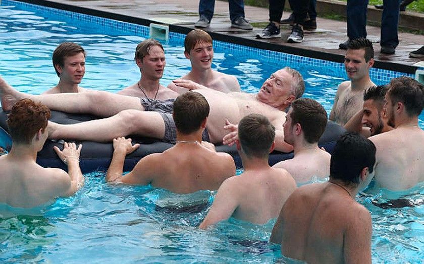 Vladimir Zhirinovsky swims in the pool with members of the LDPR Youth Organization at his personal dacha in Daryino, near Moscow.